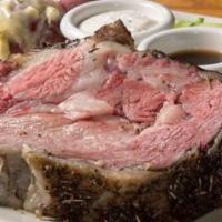 Standard Prime Rib 12 Ounces · House Specialty.... Slow Roasted and Coated in Rosemary,  Cracked Black Pepper and Thyme. Se...