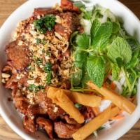  Bun Thit Nuong · grilled BBQ  pork over vermicelli.
