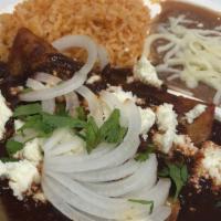 (4)Enchiladas Oaxaquenas · with mole sauce rice,beans,queso fresco,onions,cilantro and salad
