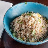 Fried Rice · Scrambled eggs, green onions, soy sauce & ginger.