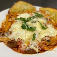 Baked Veggie Ziti · Vegetarian. Ziti pasta baked with mozzarella, ricotta cheese, marinara sauce, fresh tomatoes...
