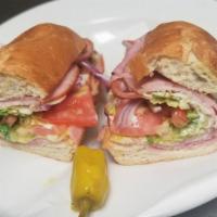 Ham & Cheese Sandwich · Mayo, mustard, tomatoes, onions and lettuce. Served on 12
