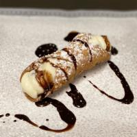 Cannoli · Home made cannoli with creamy and chocolate chip filling.