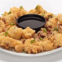 Cauliflower Bites · New. fresh cauliflower, beer battered with our california gold and fried to a golden brown. ...