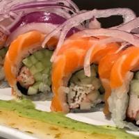 Yuzu Salmon Roll · 8 pieces, stick krab, cucmber inside, salmon, red onion on top with house yuzu sauce.