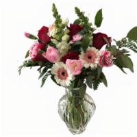 Bold Arrangement In A Vase · Extra large arrangement artfully arranged in a glass vase.