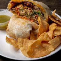 Ground Beef Quesarito · Grass-fed beef, rice, pinto beans, pico de gallo, green salsa, sour cream.