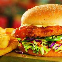 Crispy Chicken Sandwich · Come with lettuce, tomatoes, onions, pickles and mayonnaise.