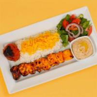 Chicken Kebab Plate · One skewer of charbroiled boneless chunks of tender chicken breast marinated white rice with...
