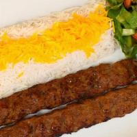 Beef Koobideh Plate · Two skewers of juicy ground beef seasoned with our special seasonings charbroiled with Basma...