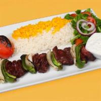 Shish Kebab Plate · One skewer of tender chunks of beef, marinated and charbroiled skewered with onions and bell...