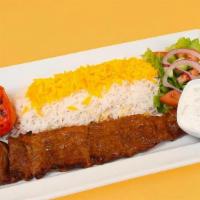 Barg Plate · One skewer of filet mignon cut into thin strips, marinated and charbroiled, Basmati rice wit...