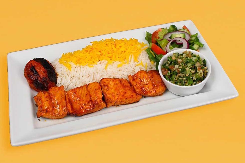 Salmon Kebab Plate · Chunks of charbroiled salmon white rice with saffron, garden salad, pita bread, grilled tomato, and an additional side of your choice included in your order.