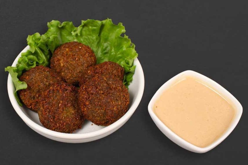 Falafel · Vegetarian favorite a mixture of garbanzo beans, vegetables, and spices 5 pieces.