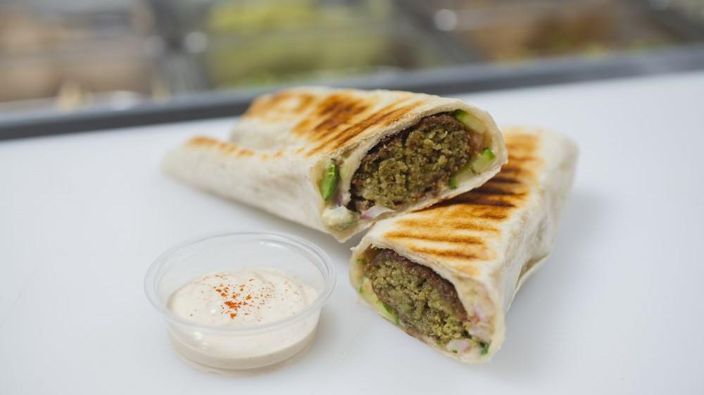 Falafel · Five pieces of fried homemade falafel with tzatziki or tahini.