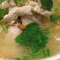 Chicken Noodle Soup · Rice noodles with chicken in house special soup.