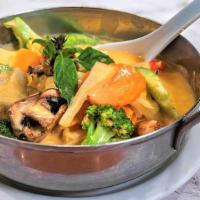 Vegetable Curry · Red curry with cabbage, broccoli, carrot, eggplant, onion, bell pepper, bamboo and mushroom....