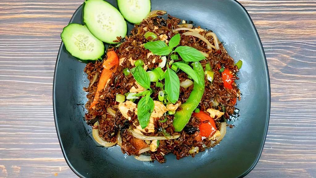 Spicy Red Rice · Stir fried spicy premium red rice with bell pepper, tomatoes and basil. Spicy.