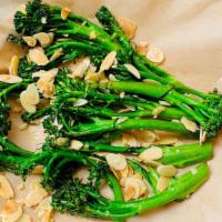 Charred Broccolini · Vegetarian. Sautéed with garlic and roasted almonds.