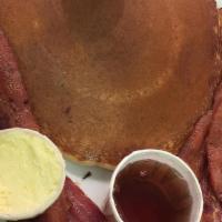 Pancakes & Bacon · Served with 3 Pancakes and 4 bacon or 4 sausages.