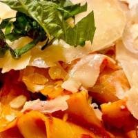 Pappardelle With Chili Flakes · Puréed tomato sauce, garlic, olive oil, pancetta, red pepper flakes, basil.