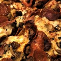 Stromboli · Italian sausage, pepperoni, salami, mushrooms, mozzarella, spicy tomato sauce.