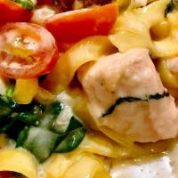 Seafood Pasta · salmon, halibut, shrimp with fettuccine in a cream sauce, sauteed spinach, diced tomatoes