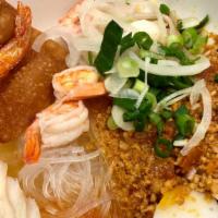 Hủ Tiếu Lotus Kho · The lotus special with clear noodles, shrimp, squid, fish ball, fried shrimp-chip & our spec...