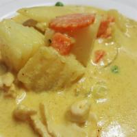 Yellow Curry · Hot. Coconut milk, potato, onion, peas and carrot.