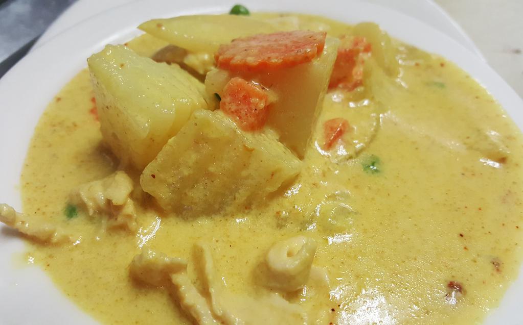 Yellow Curry · Hot. Coconut milk, potato, onion, peas and carrot.