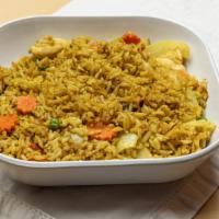 Pineapple Fried Rice · Carrot, peas, onion, curry powder, pineapple and egg.