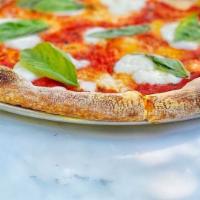 Margherita Pizza · tomato. buffalo mozzarella. basil