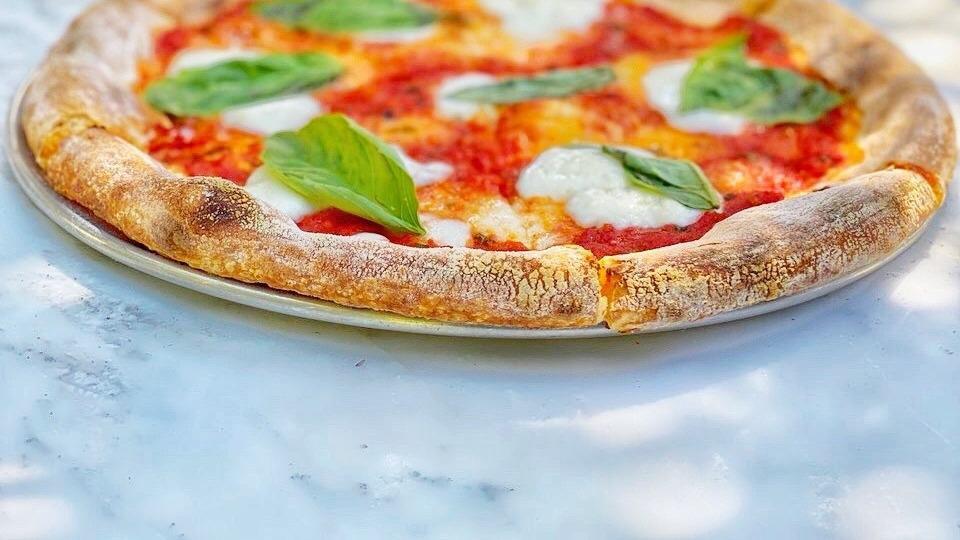 Margherita Pizza · tomato. buffalo mozzarella. basil