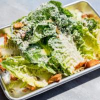 Tj Caesar** · Hearts of romaine, oven roasted tomatoes, cotija cheese and pepitas with homemade croutons. ...