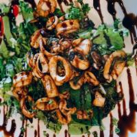 Calamari All'Aceto Balsamico · Squid with tentacles and mix greens tossed in extra virgin olive oil and balsamic vinegar, t...