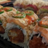 Fire Salmon Roll · Inside: Shrimp, Spicy Tuna / Outside: Salmon / Sauce: Unagi sauce, Spicy mayo, Sriracha / To...