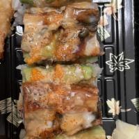 Dragon Roll · Inside: Shrimp, Cucumber / Outside: Unagi, Avocado / Sauce: Unagi Sauce, Spicy Mayo, Creamy ...