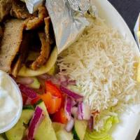 Gyro Plate · Served with salad, rice, pita bread and tzatziki sauce.