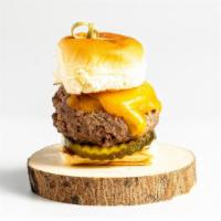 Original Slider · Cheese burger, secrete sauce, pickle on a hawaiian roll.