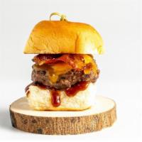 Bbq-Bacon Slider · Cheese burger, bacon, garlic aoli, hickory bbq sauce on a hawaiian roll.