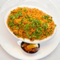 Pulav · Steamed basmati rice with signature spices and vegetables.