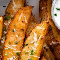 Potato Wedges · THICK-CUT POTATO WEDGES / SOUR CREAM-CHIVE SEASONED TO PERFECTION