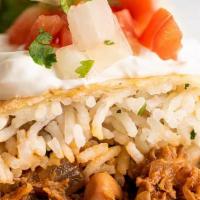 Shredded Beef Wham! Burrito · House burrito with shredded beef, Mexican rice, black beans, pico de gallo and salsa.
