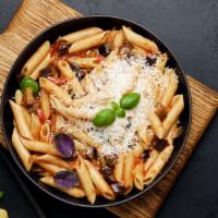 Eggplant Parmesan · Breaded eggplant topped with mozzarella cheese and marinara sauce, with spaghetti.
