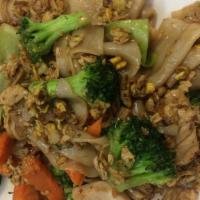 Pad See Ew · Choice of meat stir-fried wide rice noodles with egg, broccoli, cabbage, garlic, and carrot ...