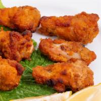 Chicken Wings · Fried drumette wings served with dipping sauce.