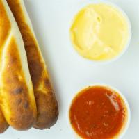 Breadsticks · Three breadsticks with choice of sauce