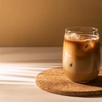 Iced Espresso · Double shot of espresso poured over ice.
