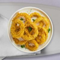 Super Onion Rings · Sliced onions dipped in a light batter and fried until crispy and golden brown.