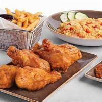 Family Meal · 12 wings (bone-in or boneless), 6 drums, choice of 2 sides and choice of white rice or plain...